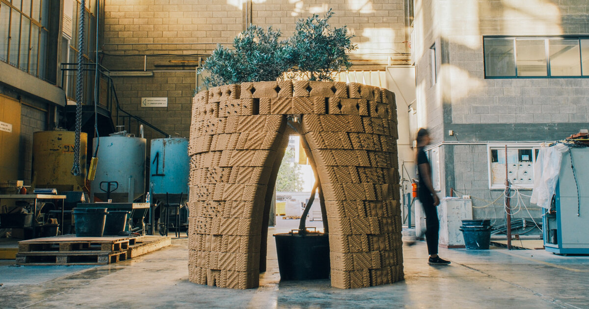 robotically 3D printed earth bricks wrap multispecies habitat around olive tree