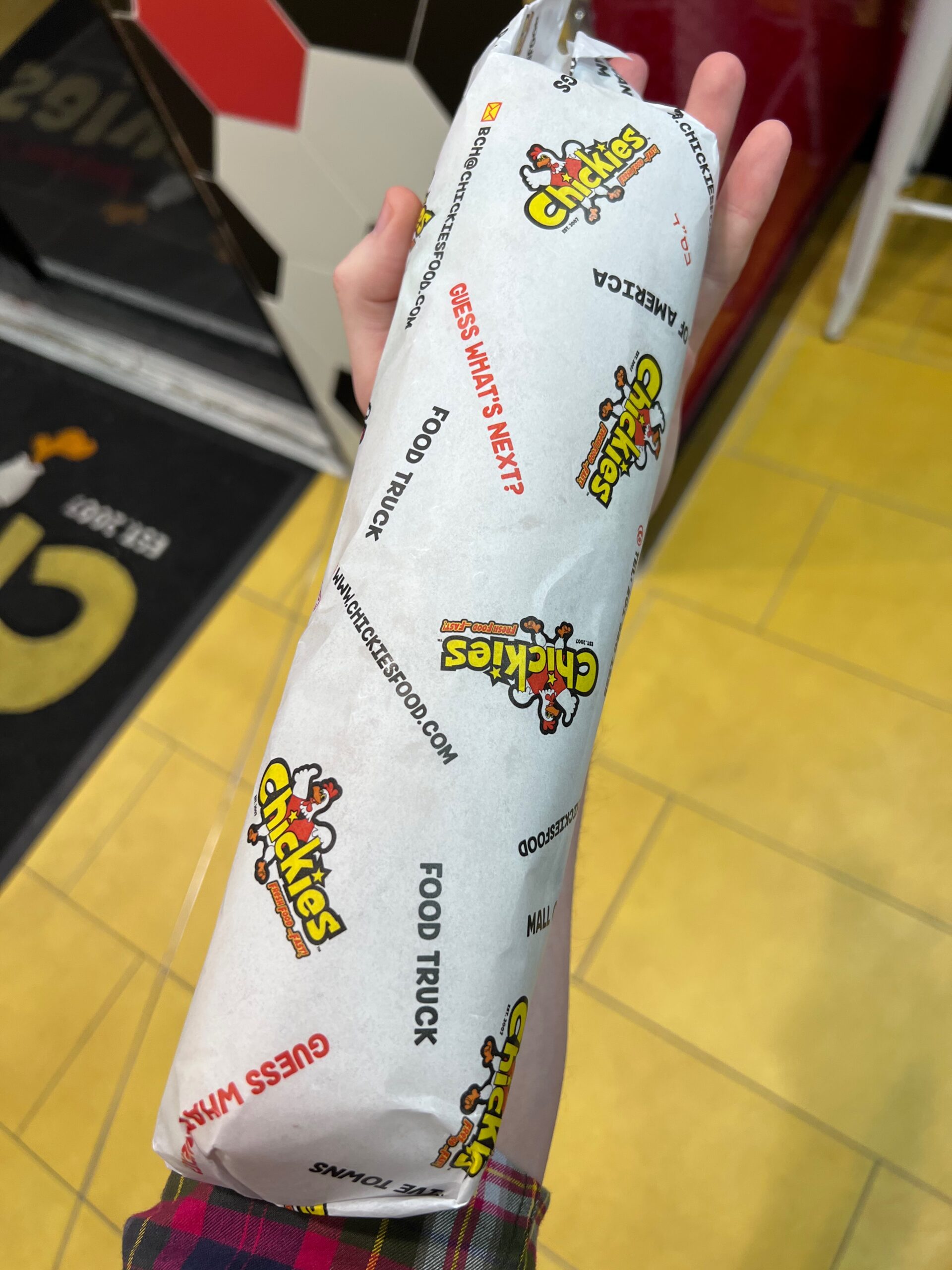 Chickies sandwich in its wrapper at the Chickies 5 Towns kosher restaurant in Cedarhurst, NY
