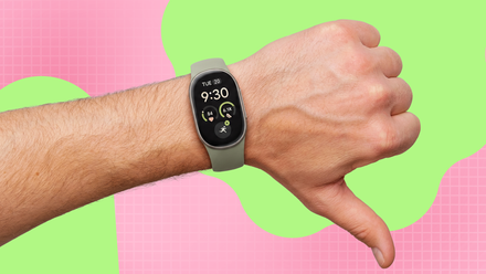Fitbit Edge on a wrist with a thumbs-down gesture.