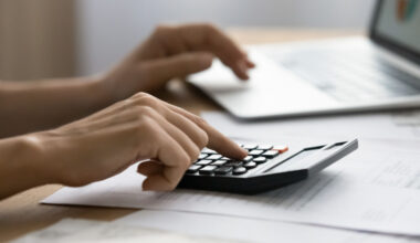 person using a calculator