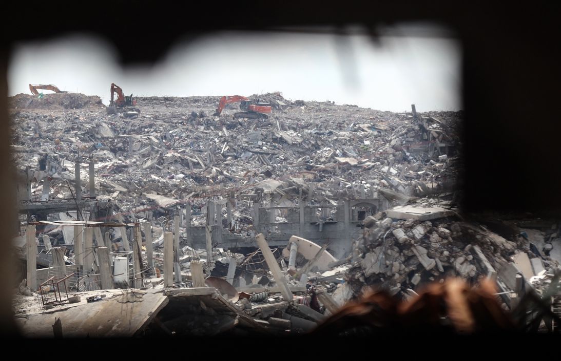 Israeli forces use bulldozers east of Jabalya, northern Gaza, on April 13. Human rights groups have warned the use of heavy machinery to clear rubble could erase evidence of possible war crimes.
