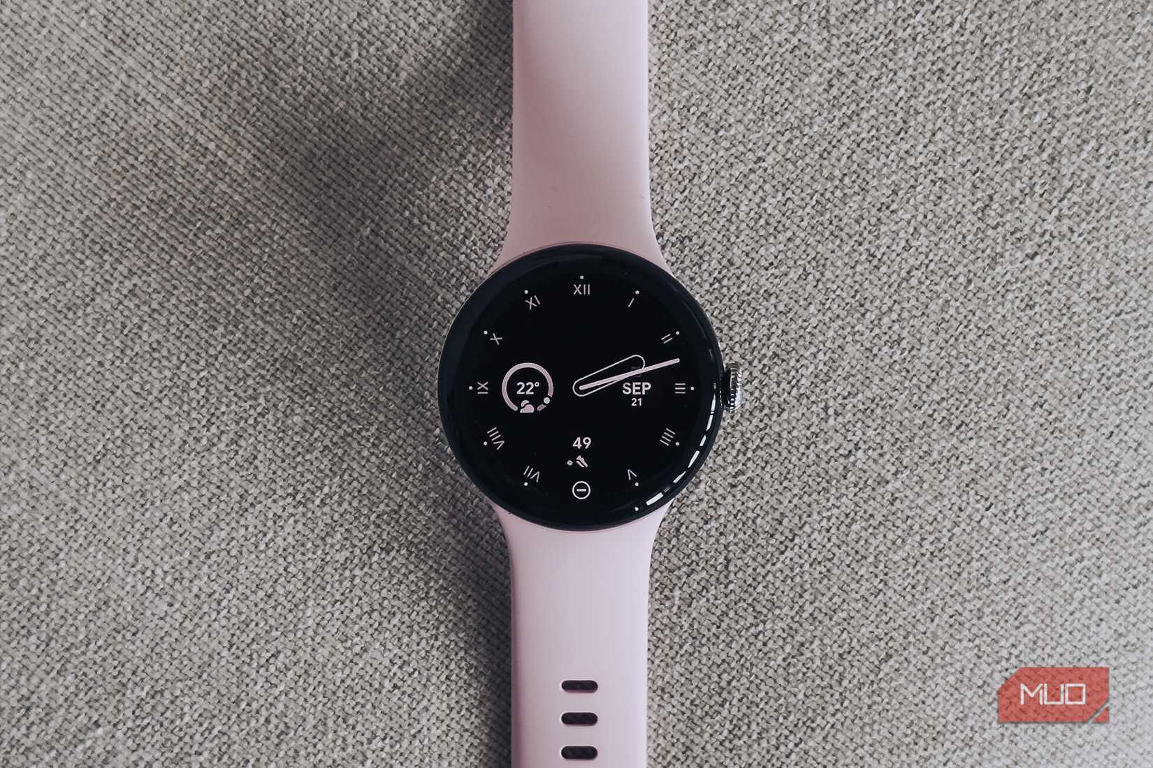Google Pixel Watch 3 on white fabric surface