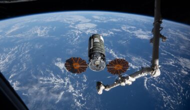 iss074e0458241 (April 13, 2026) --- Northrop Grumman's Cygnus XL cargo spacecraft rests at its capture point, 12 meters from the International Space Station, as the Canadarm2 robotic arm prepares to grapple the resupply ship. Cygnus XL delivered more than 11,000 pounds of new science experiments, lab hardware, and crew supplies for the Expedition 74 crew.