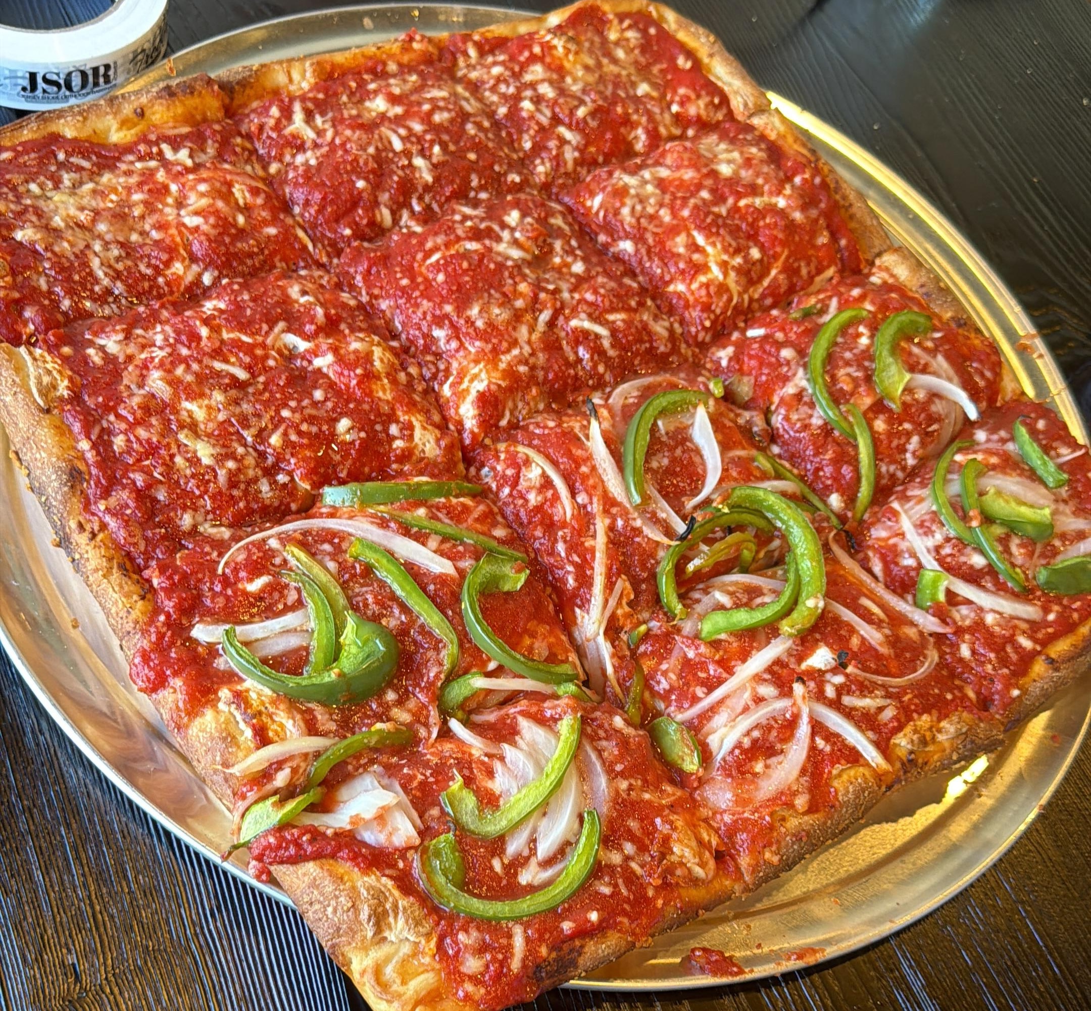 A half-plain, half-vegetable square pie at Kosher Square Pizza