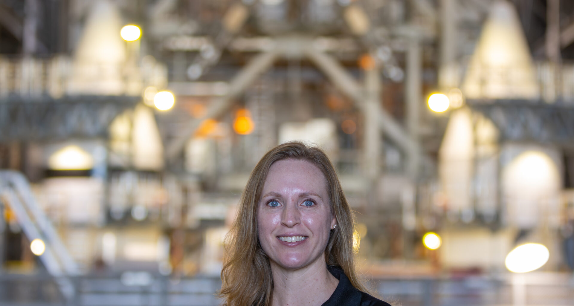 Portrait of Allison Mjoen inside the Vehicle Assembly Building