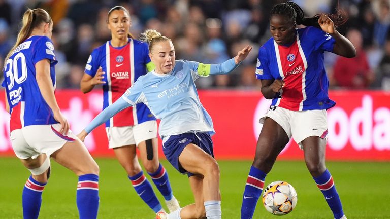 Manchester City's Alex Greenwood is tackled by Paris Saint-Germain's Emilie Osteras (left) and Griedge Mbock Bathy