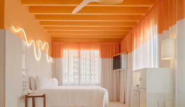 OHLAB experiments with colour-blocking and cork in old and new buildings of Terreno Barrio Hotel in Mallorca