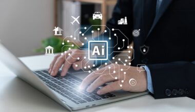 Business professional using a laptop with an AI network and industry icons overlay