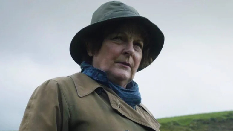 Brenda Blethyn's Vera Stanhope wearing a hat and looking stern on Vera