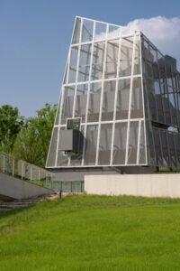 Tower clad in mesh