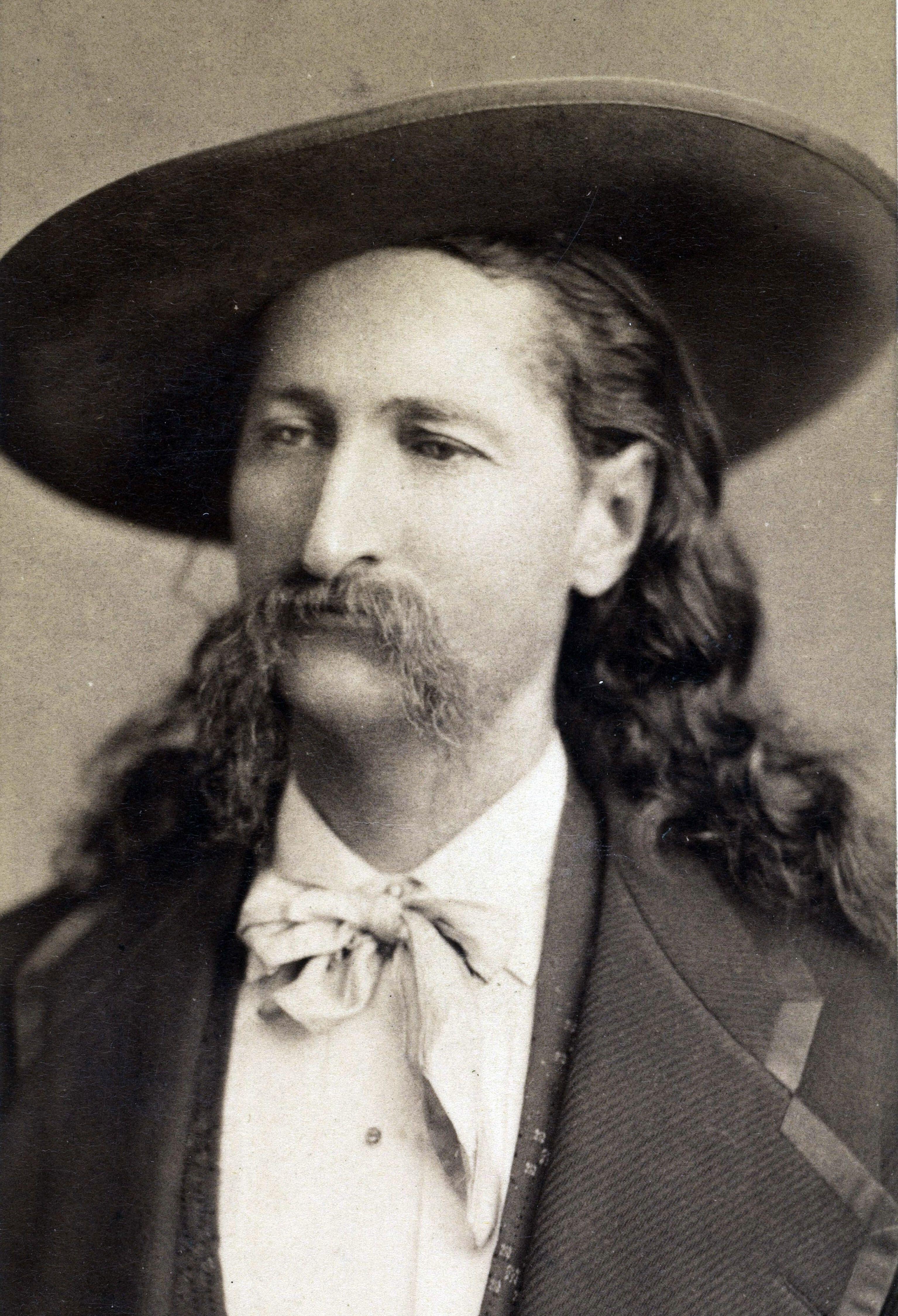 James Butler, "Wild Bill" Hickok, an American western hero, wearing a hat, with long hair and a mustache.
