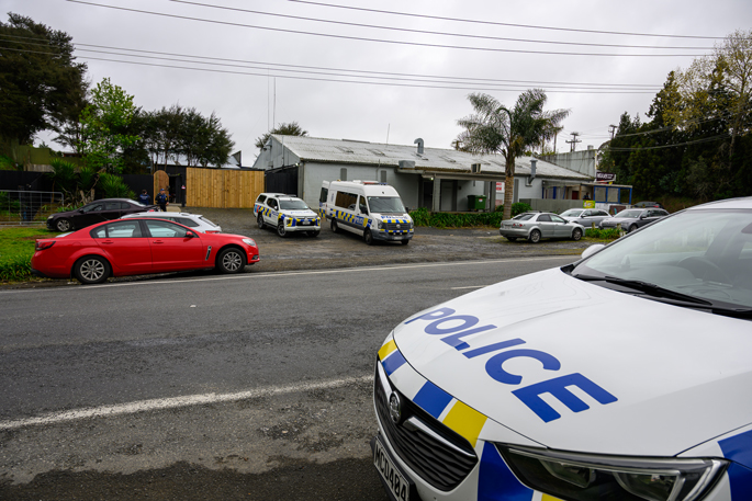 SunLive - Armed police block road in dawn WBOP operation