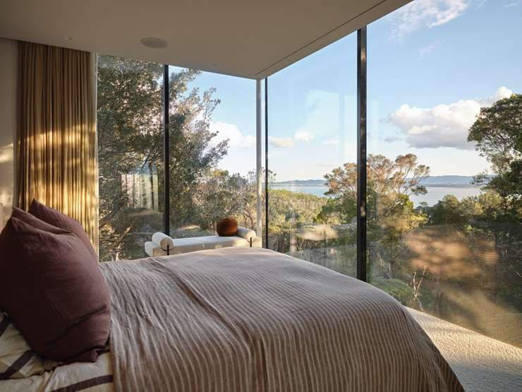 Alex and Corban Walls's trophy home on Island Bay Road, in Beach Haven, Auckland, sold under the hammer today after strong biddding. Photo / Supplied