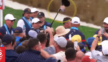 Watch: Beer almost hits Erica and Rory McIlroy in ugly Ryder Cup scenes