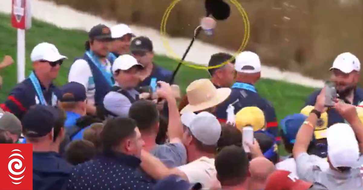 Watch: Beer almost hits Erica and Rory McIlroy in ugly Ryder Cup scenes