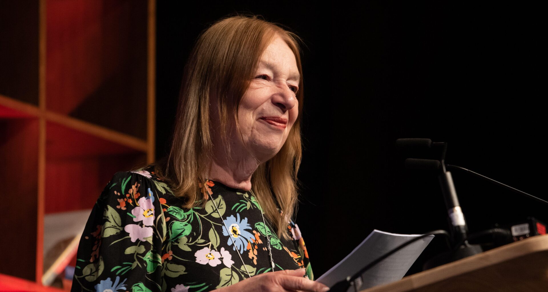 Alison Weir wears a floral dress at a book festival