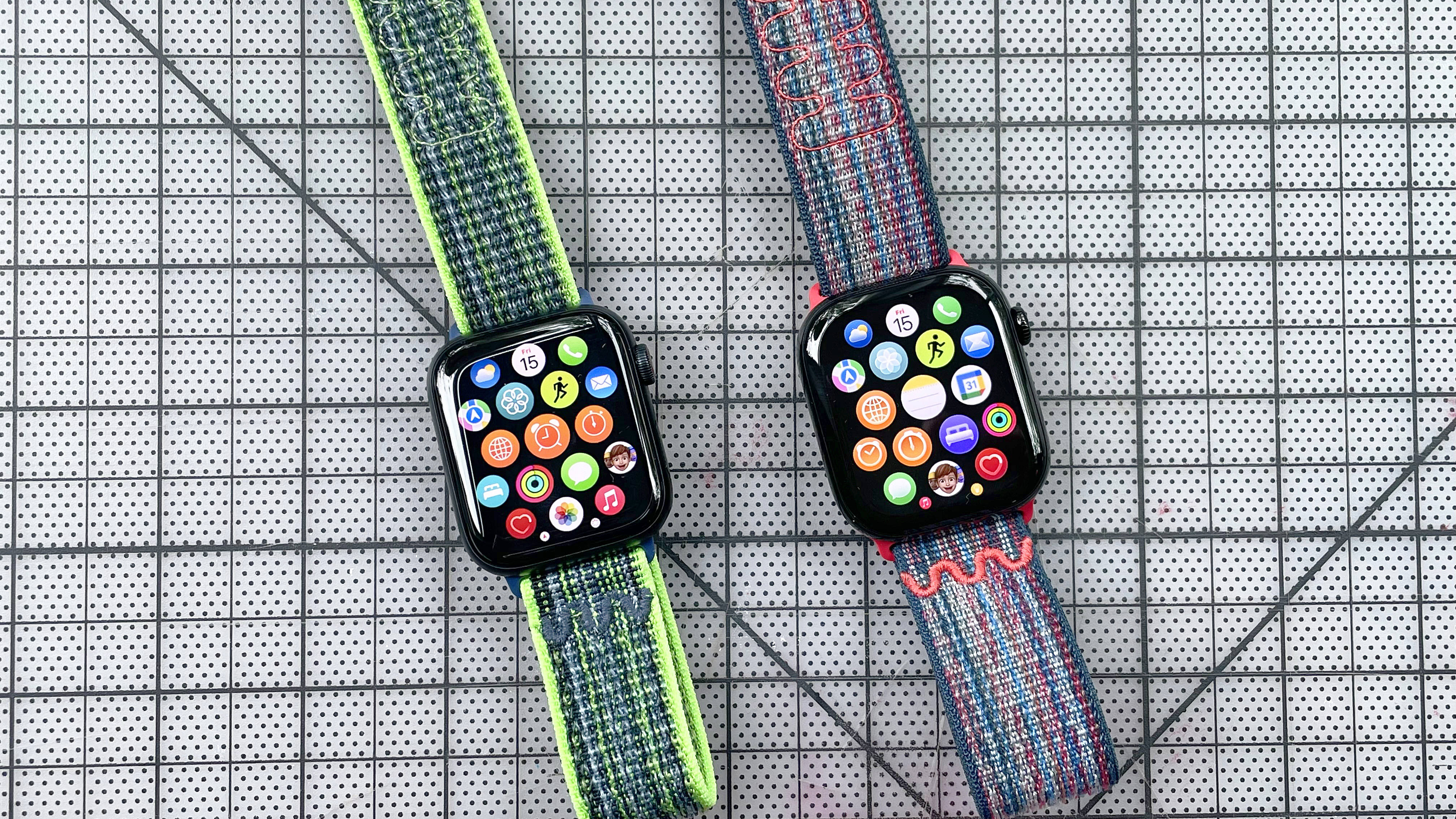 Close-up of an Apple Watch SE 2022 and Apple Watch Series 10; the former has a Nike Sport Loop dupe attached and the latter has the actual Nike Sport Loop strap