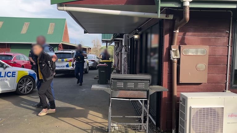 A man is arrested at one of the grow houses.
