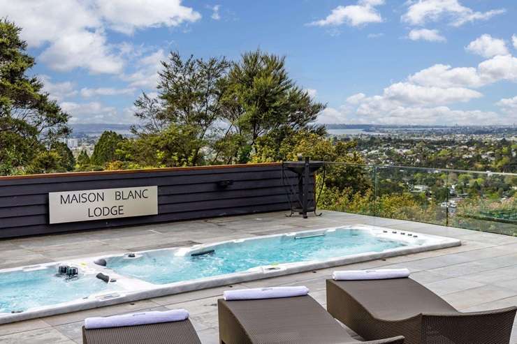 Maison Blanc Lodge, in Titirangi, Auckland, is on the market for sale. Photo / Supplied
