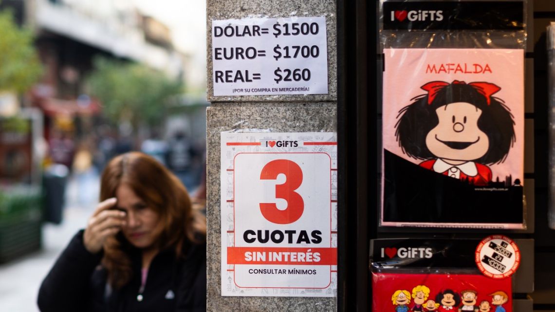 Currency prices displayed in a storefront in the financial district of Buenos Aires on September 8.