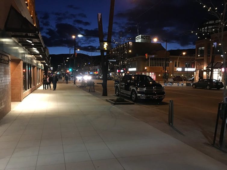 a downtown city street at dusk