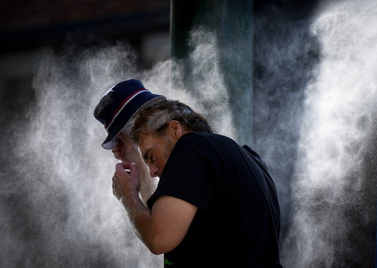 A man surrounded by mist