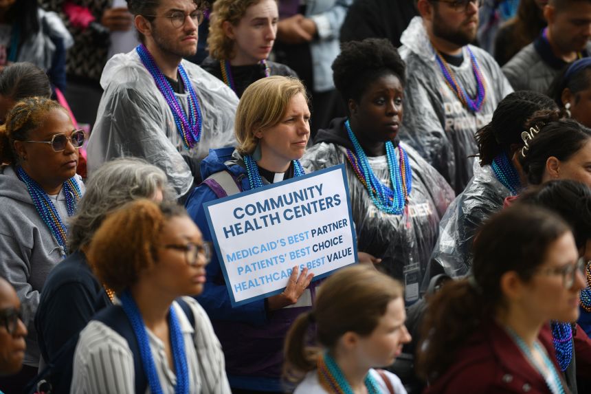 People protest Medicaid cuts in Washington, DC, on May 22.
