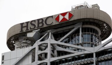 The HSBC logo and red hexagon emblem displayed on the top of the bank's headquarters building in Hong Kong