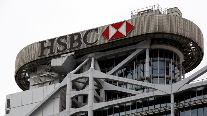 The HSBC logo and red hexagon emblem displayed on the top of the bank's headquarters building in Hong Kong