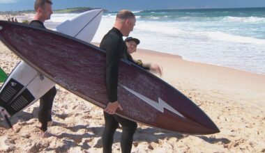 Friends of shark attack victim return to the water to 'confront' fear
