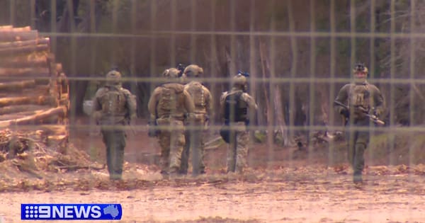 Restrictions lifted as manhunt for Victoria cop killer continues