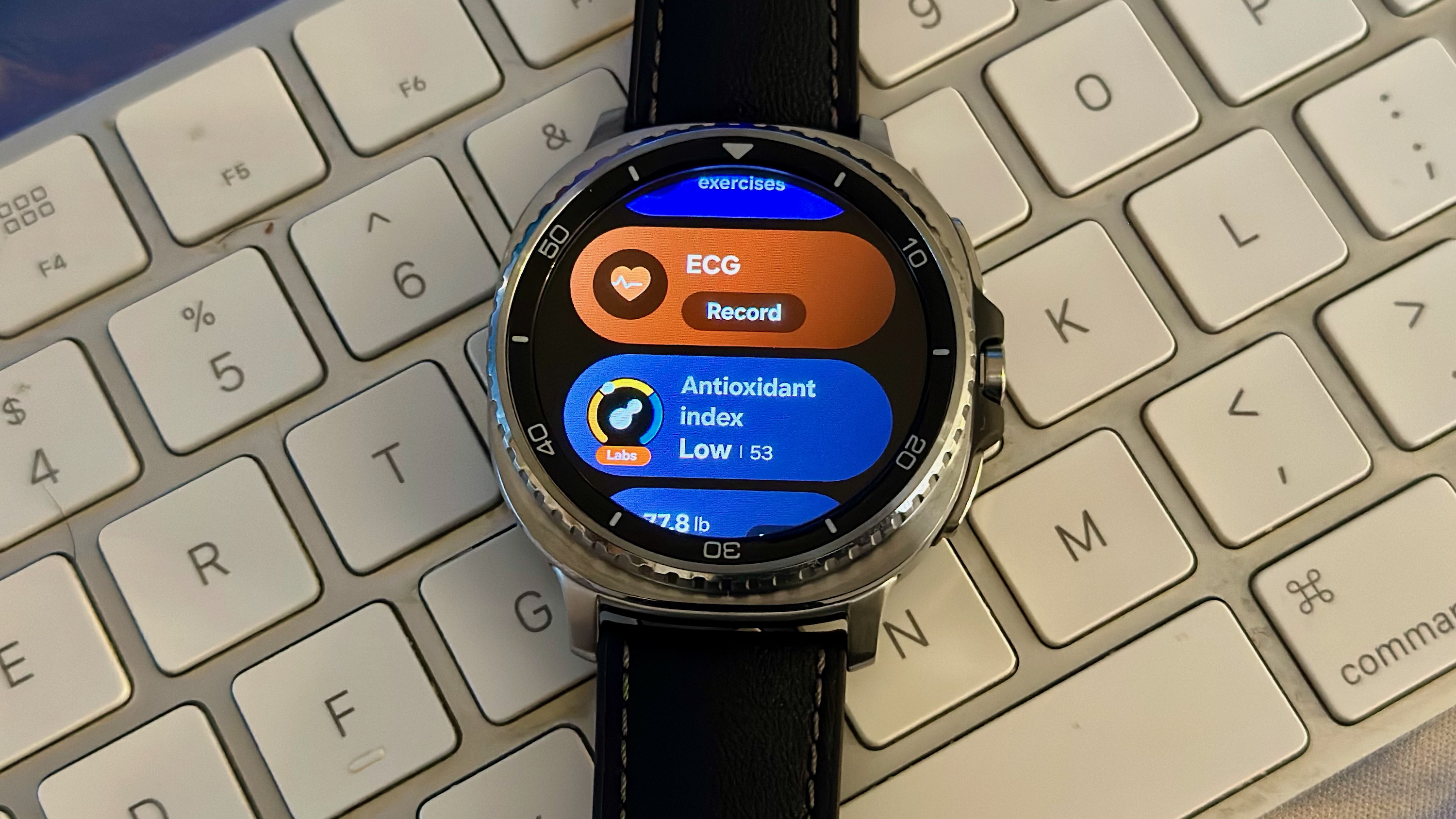 The Health Tile on the Samsung Galaxy Watch 8 Classic showing ECG and antioxidant index