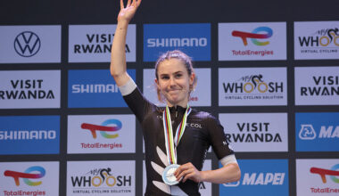 Silver medallist New Zealand rider Niamh Fisher-Black celebrates on the podium following the women's Elite road race cycling event during the UCI 2025 Road World Championships, in Kigali, on September 27, 2025. (Photo by Anne-Christine POUJOULAT / AFP)
