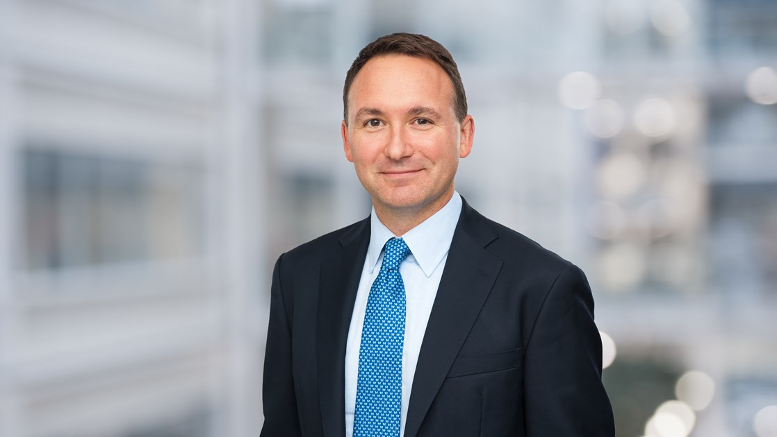Luke Miels, head of the pharma commercial business at GSK, smiles at the camera.