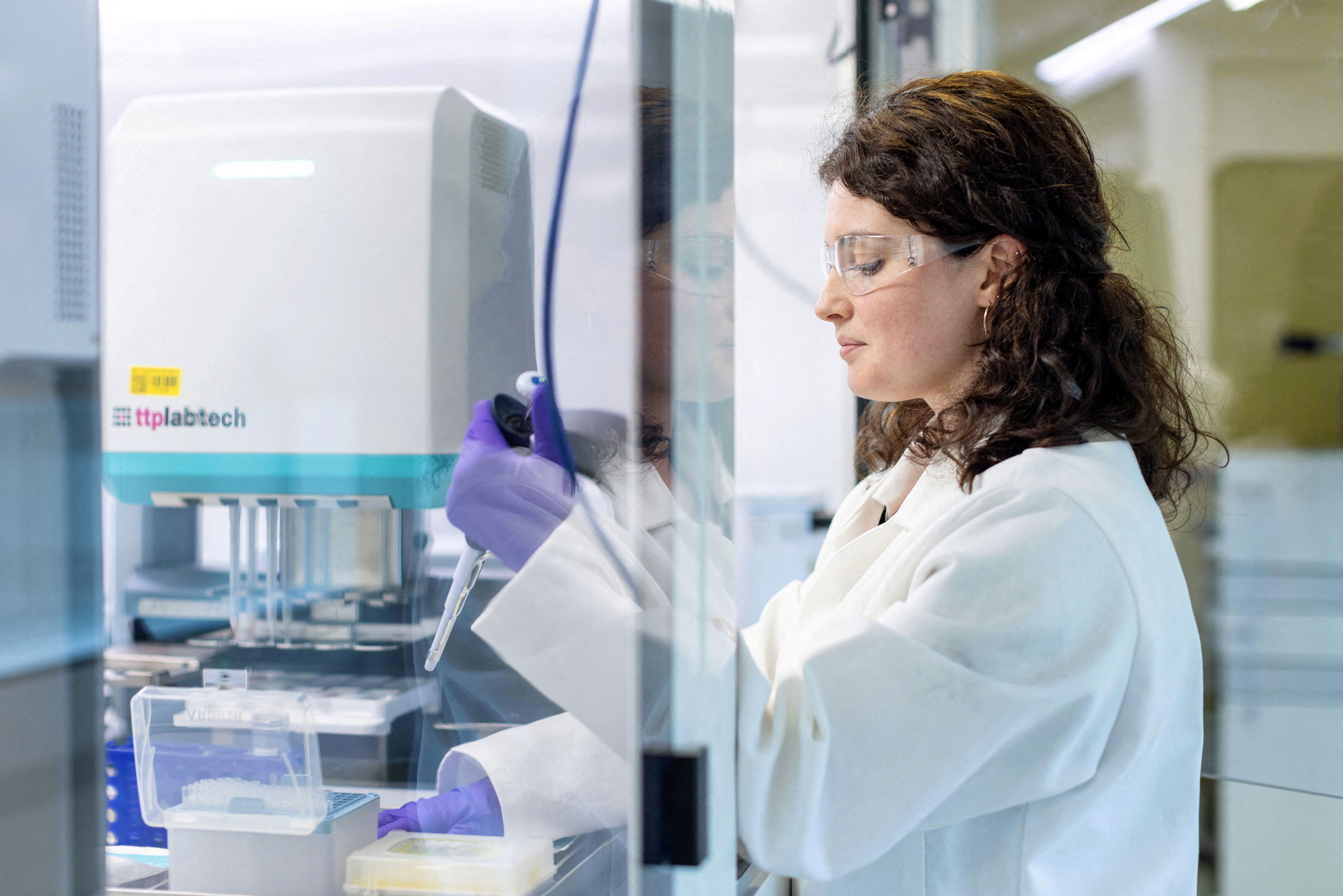 Senior Scientist Alice Rockliffe works in a lab at the GSK Research and Development centre.