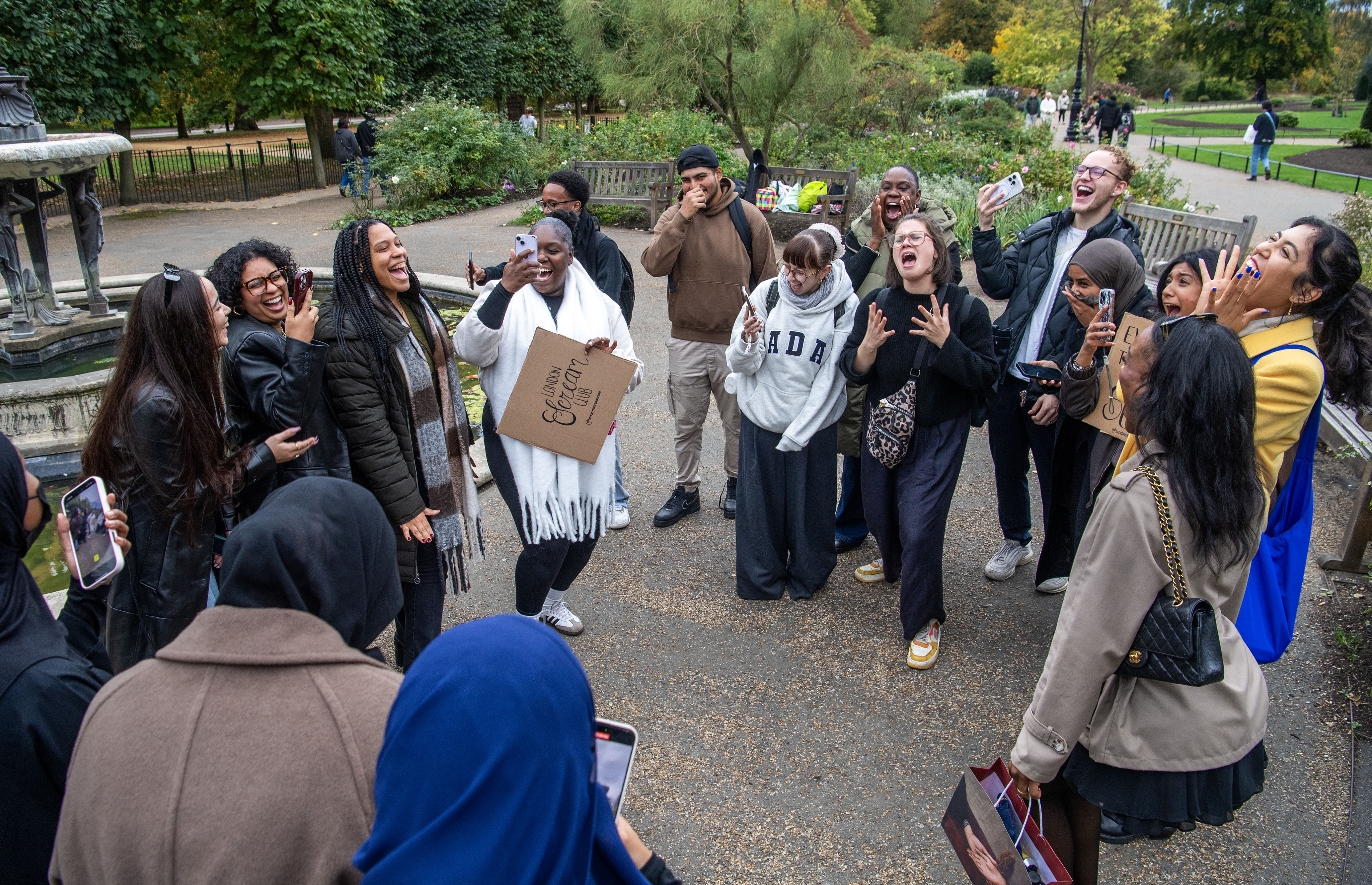 People gathering in Hyde Park for a London Scream Club meeting.