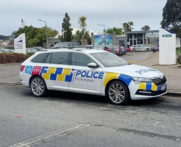 Police outside the school entrance this morning. Photo: Toni McDonald 
