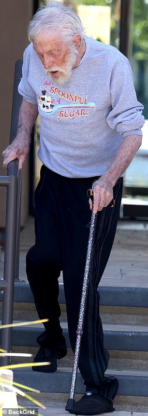 In a touch of fan service, he wore a sweater that read: 'Just a spoonful of sugar,' a famous phrase from his 1964 musical classic Mary Poppins