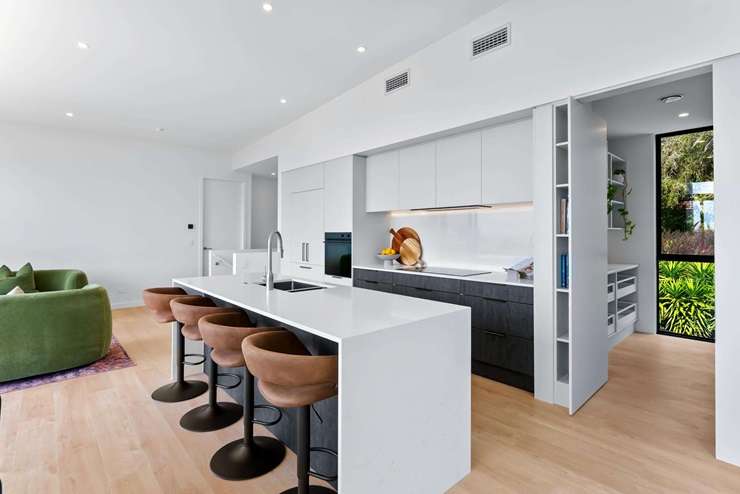 Alice and Caleb Pearson are proud of their work on Rosario Crescent: “They are amazing homes. Whenever we go there, it’s like we want to live there.” Photo / Supplied