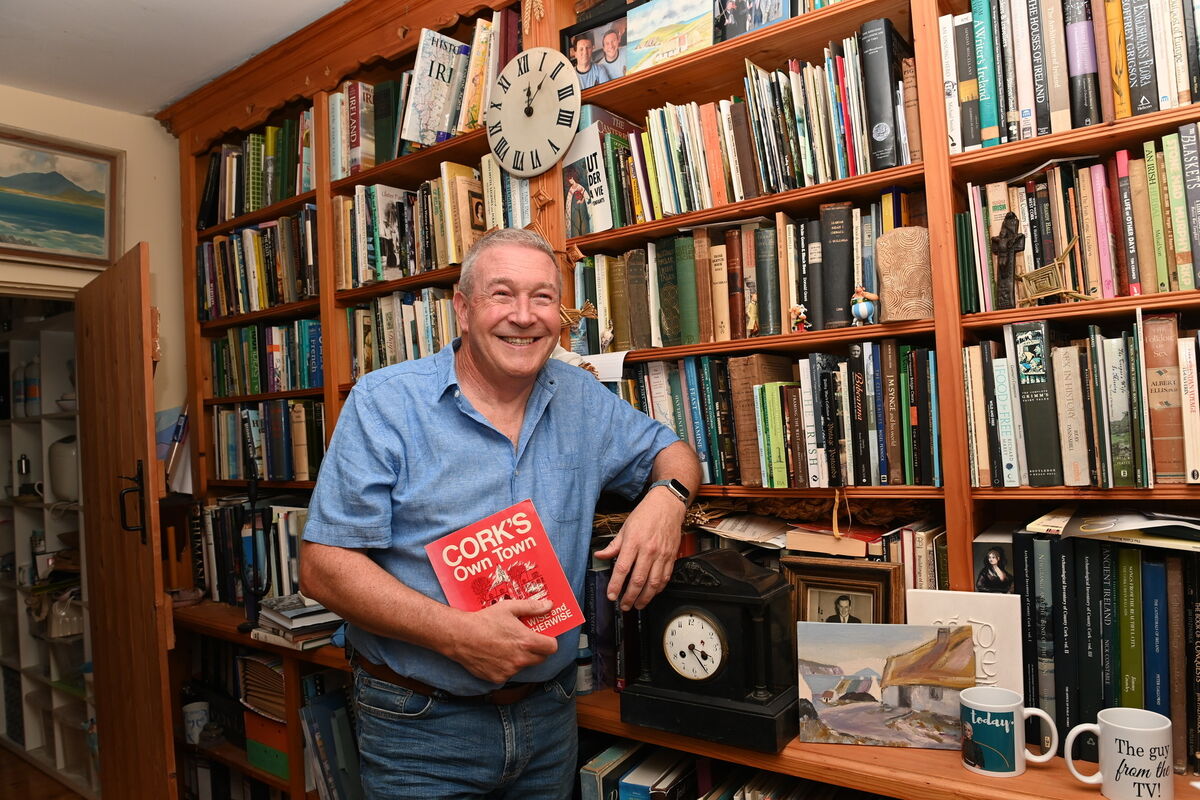 UCC's Shane Lehane, holding a book of his father’s published cartoons that featured in The Evening Echo. Picture: Larry Cummins UCC's Shane Lehane, holding a book of his father’s published cartoons that featured in The Evening Echo. Picture: Larry Cummins
