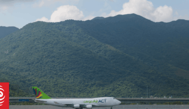 Cargo plane slides off runway in Hong Kong, media reports two dead