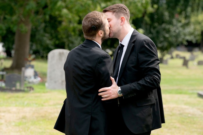 Ben and Callum kissing at the graveside in EastEnders