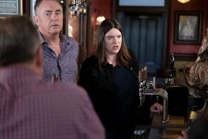 Zoe looking shifty next to Alfie in EastEnders