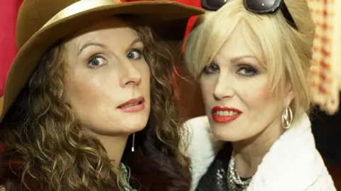 BBC Jennifer Saunders (left) and Joanna Lumley in character in the Absolutely Fabulous Christmas special in 2004
 
