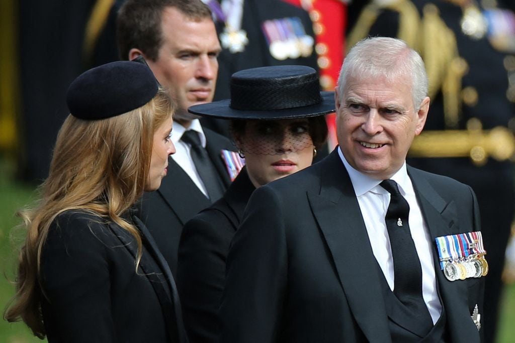 Prince Andrew with his daughters, Beatrice and Eugenie of York.