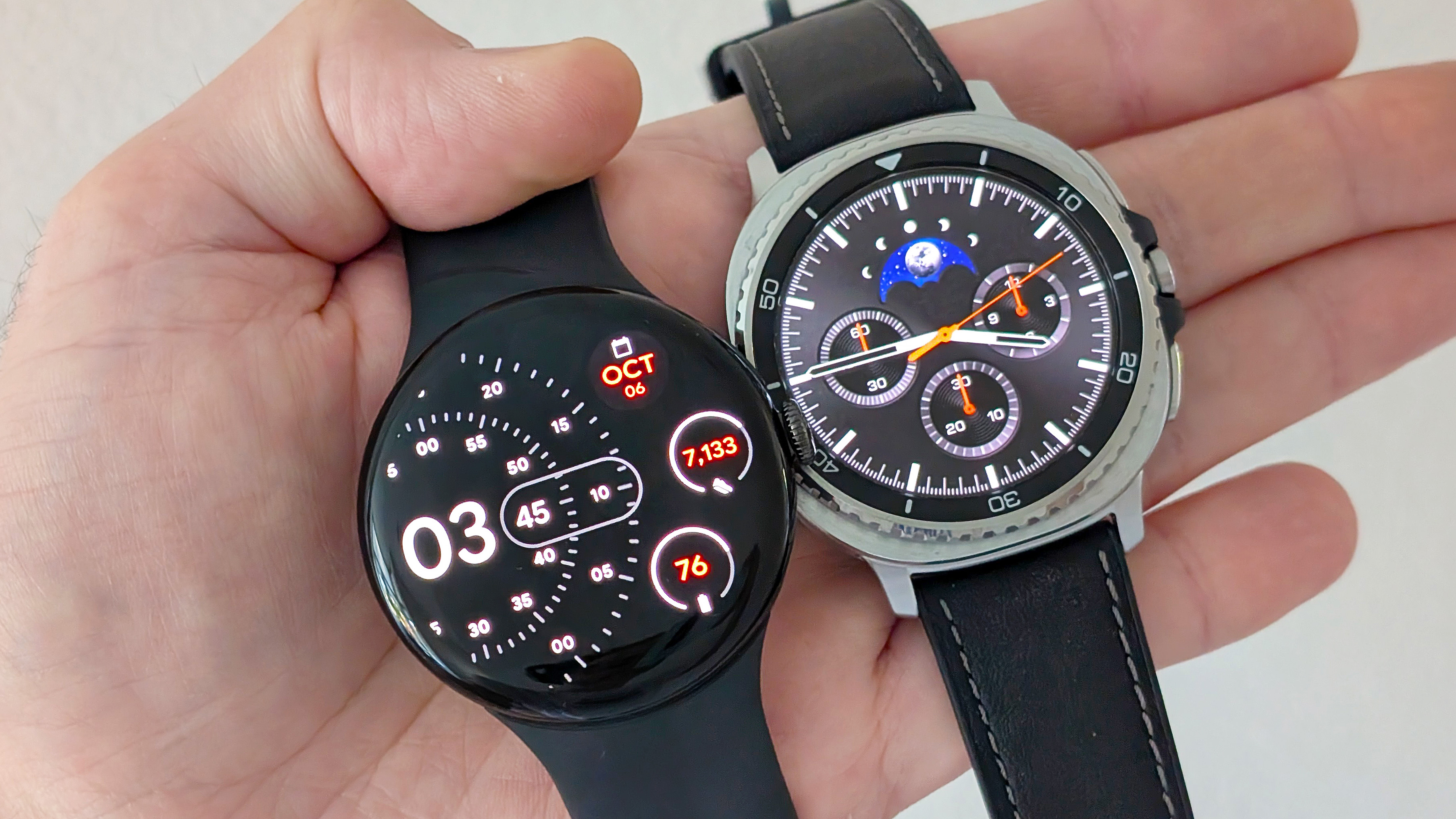 Close-up of the Google Pixel Watch 4 in black on a black strap