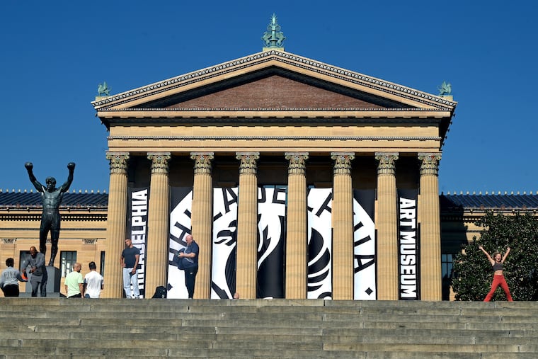 Banners with the new name at the east entrance to the Philadelphia Art Museum.