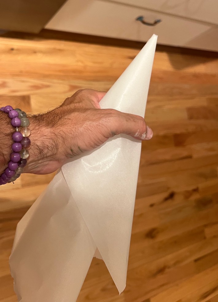 A folded paper cone.