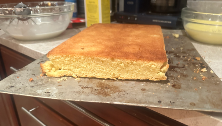 Trimmed cake edge.