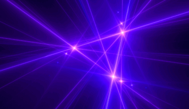 Computer generated image of a laser beam creating a triangular shape in the center of the image.